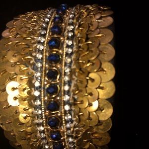 Women cuff bracelet adjustable stay in place because of the rigid metal